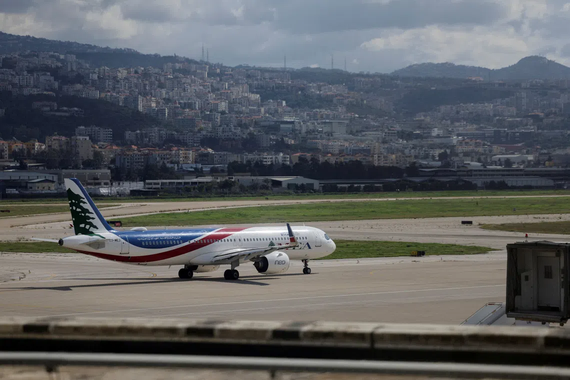 FILE PHOTO: A Lebanese Middle East Airlines (MEA) aircraft on the tarmac at Beirut-Rafic Hariri International Airport, following an escalation between Hezbollah and Israel, amid the U.S.-Israel conflict with Iran, in Beirut, Lebanon, March 4, 2026. REUTERS/Khalil Ashawi/File Photo