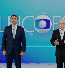 Flávio Bolsonaro e Lula durante debate da Globo Foto: Divulgação/Globo