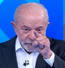 O presidente Lula ao reagir à fala de Flávio Bolsonaro sobre ter "nove dedos" Foto: Reprodução/TV